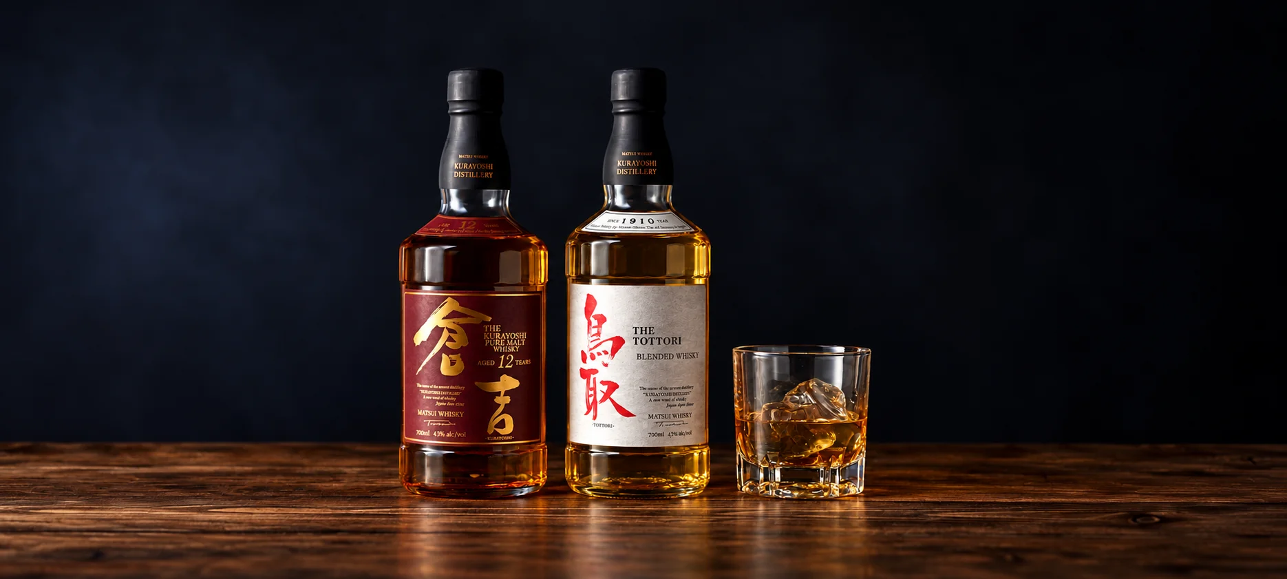 Matsui Whisky bottles and a glass of whisky on a wooden table at the pairing dinner at elcielo Bogotá